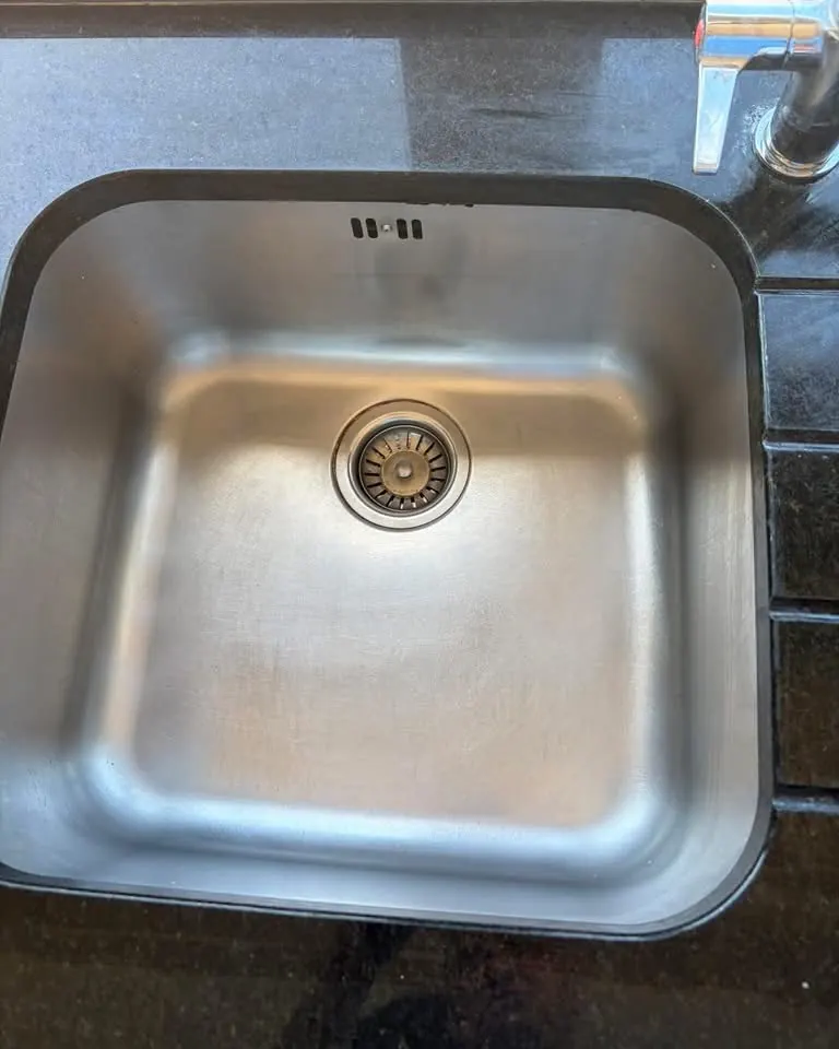 Stainless sink restored after cleaning by Trotters